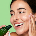 Load image into Gallery viewer, Our global best-selling lightweight yet nourishing serum instantly replenishes your skin’s moisture for a soft, glowing complexion. Formulated with a blend of Jeju Green Tea Extract and Green Tea Seed Oil that work together to help maintain skin’s delicate balance and retain moisture longer.